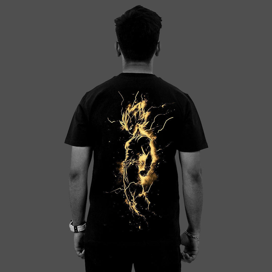 Rear view of model wearing a regular fit Saiyan black t-shirt with glowing gold energy print
