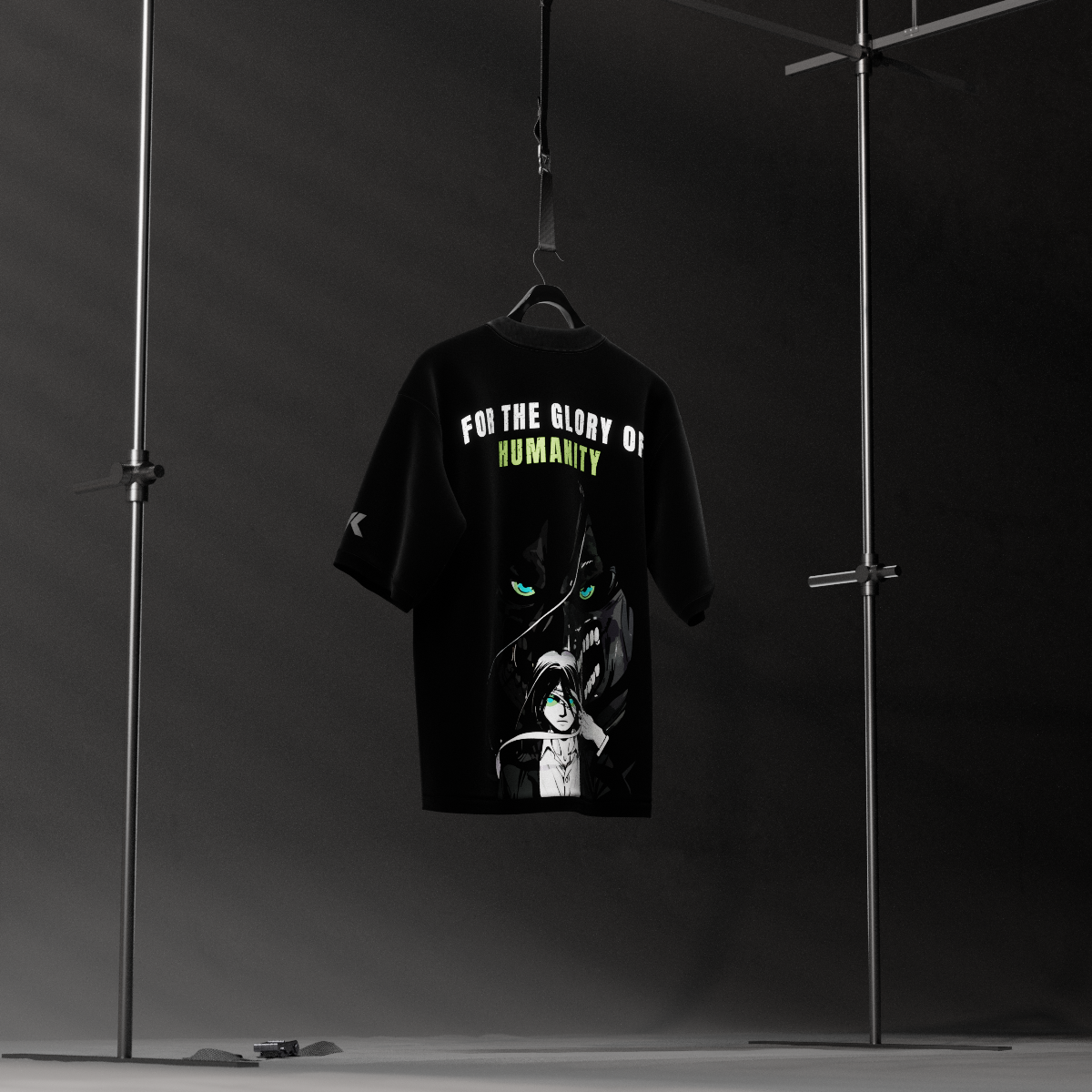 Eren Yeager black oversized t-shirt hanging on a rack showing back print For the Glory of Humanity with titan artwork