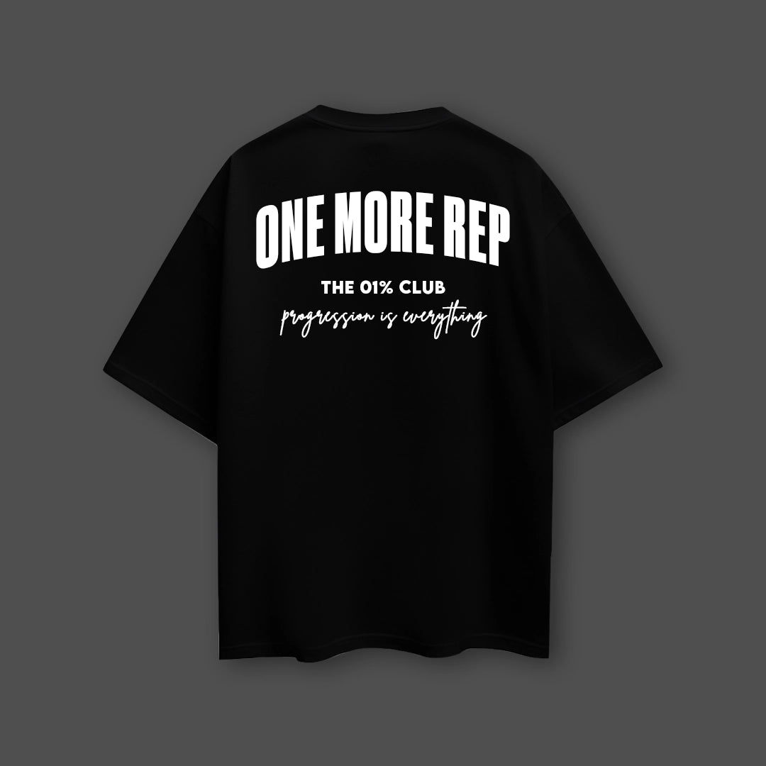 Black oversized streetwear t-shirt featuring a motivational back design with bold lettering