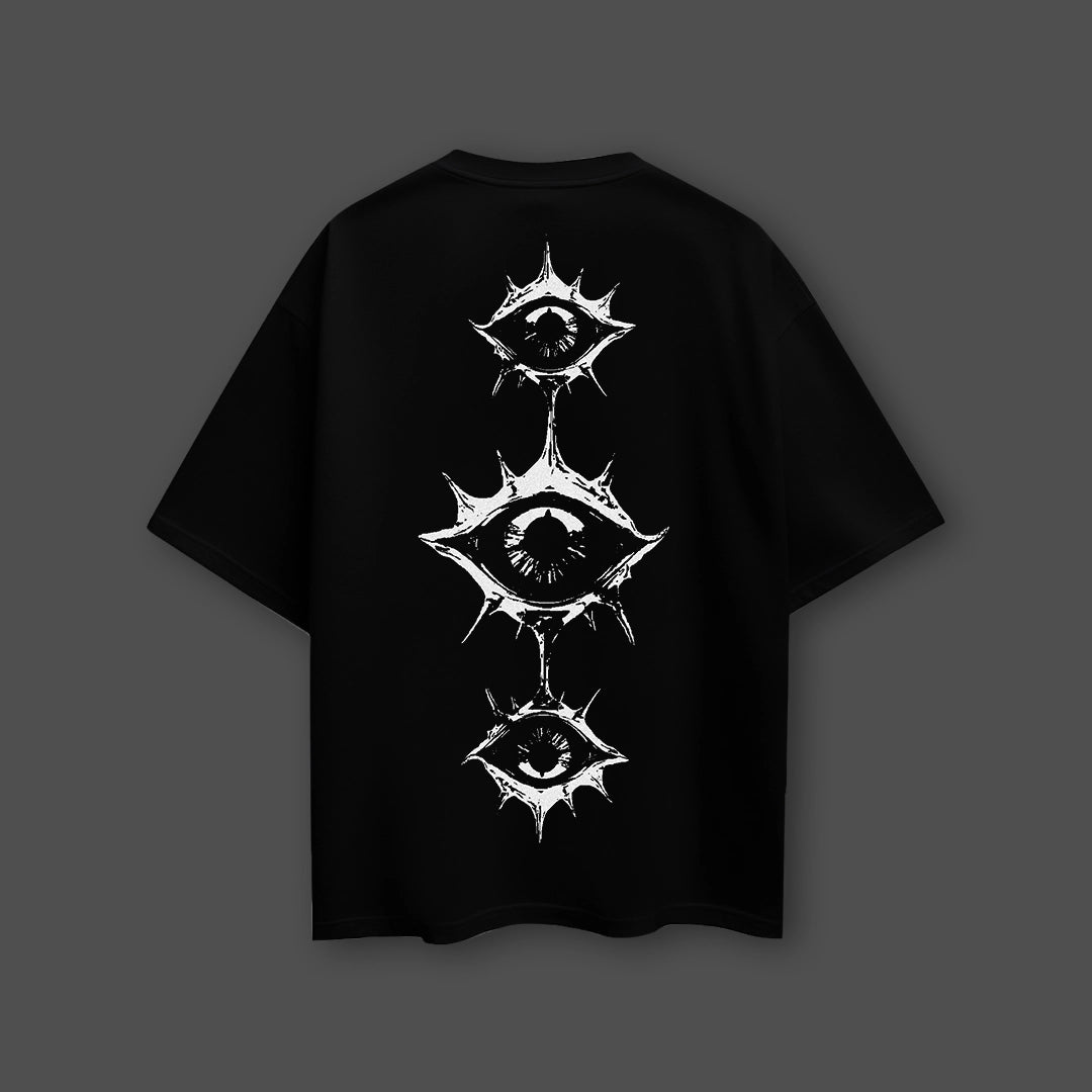 Eye graphic oversized black t-shirt featuring a striking eye design on the back