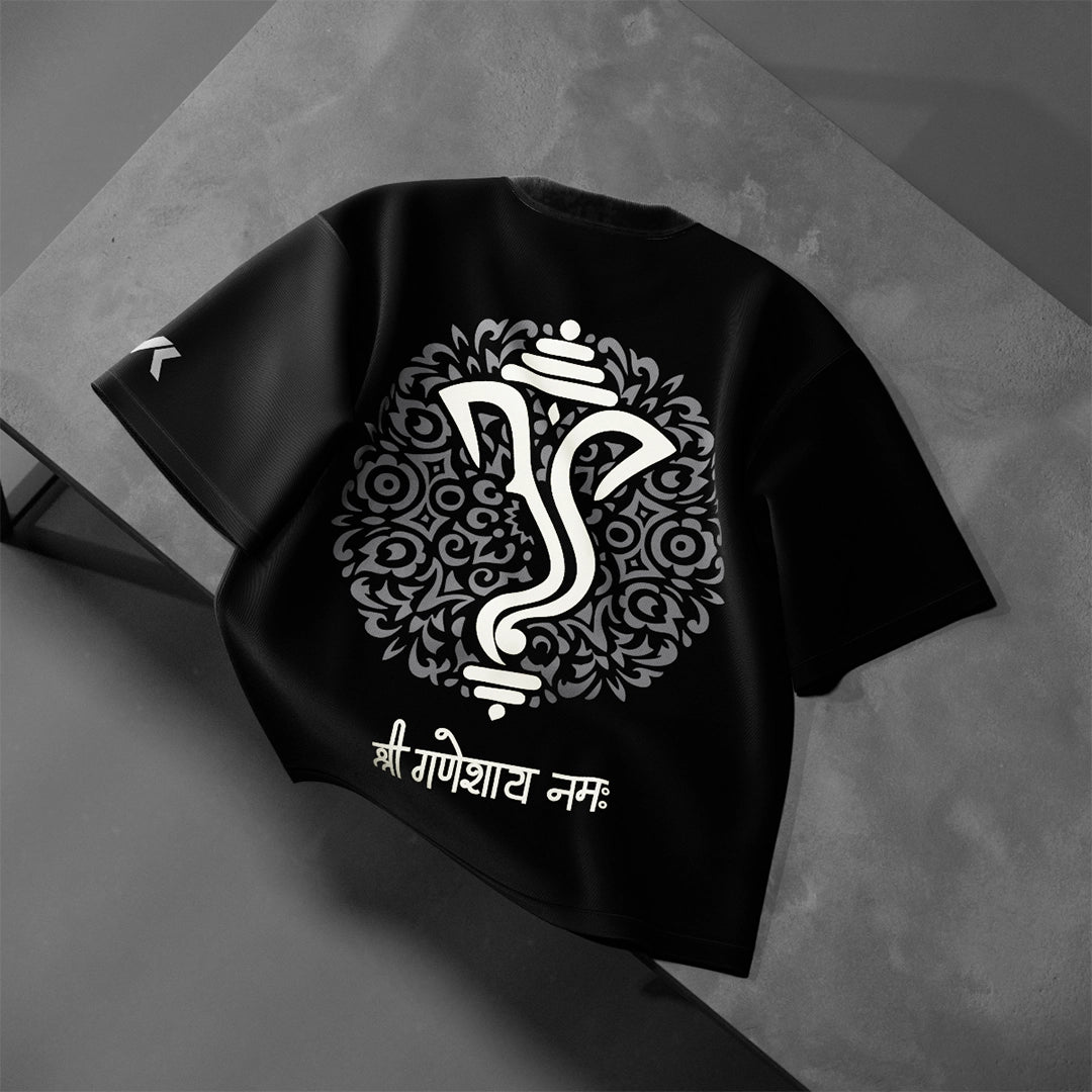Ganesh oversized black t-shirt featuring intricate design and spiritual text on the back