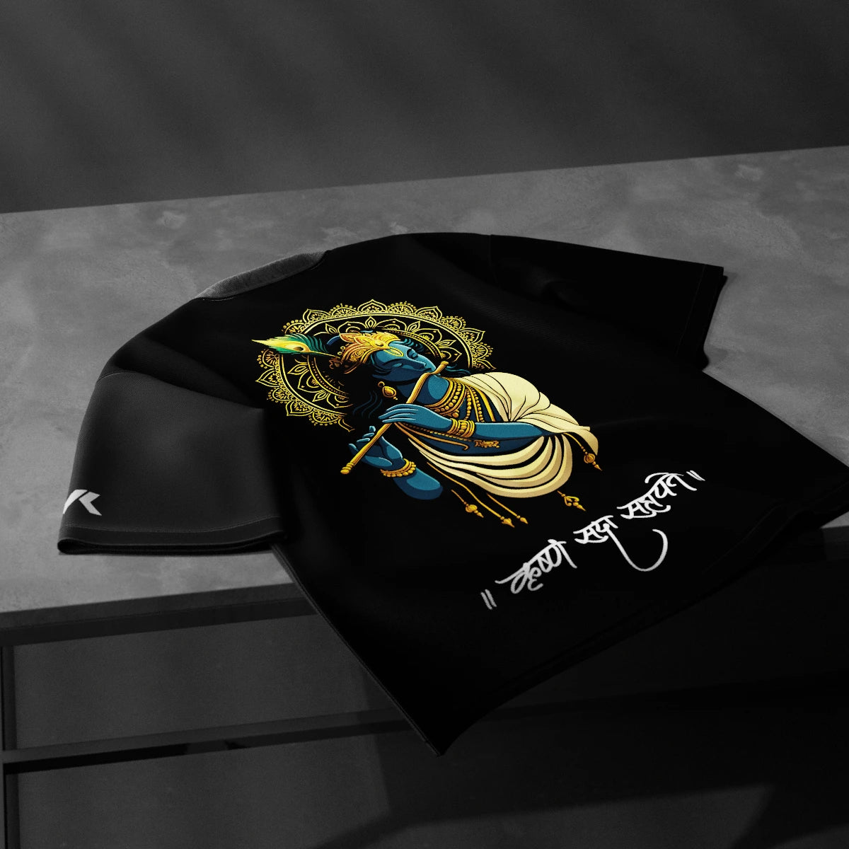 Krishna oversized black t-shirt featuring vibrant artwork and spiritual design on a stylish fabric