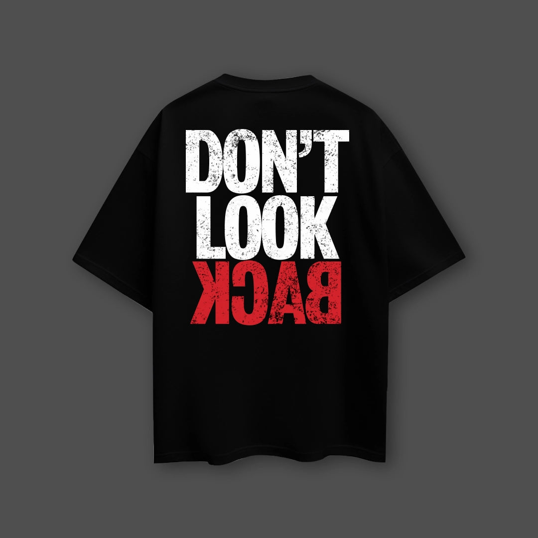 Oversized black streetwear t-shirt featuring striking 'Don't Look Back' graphic design on the back