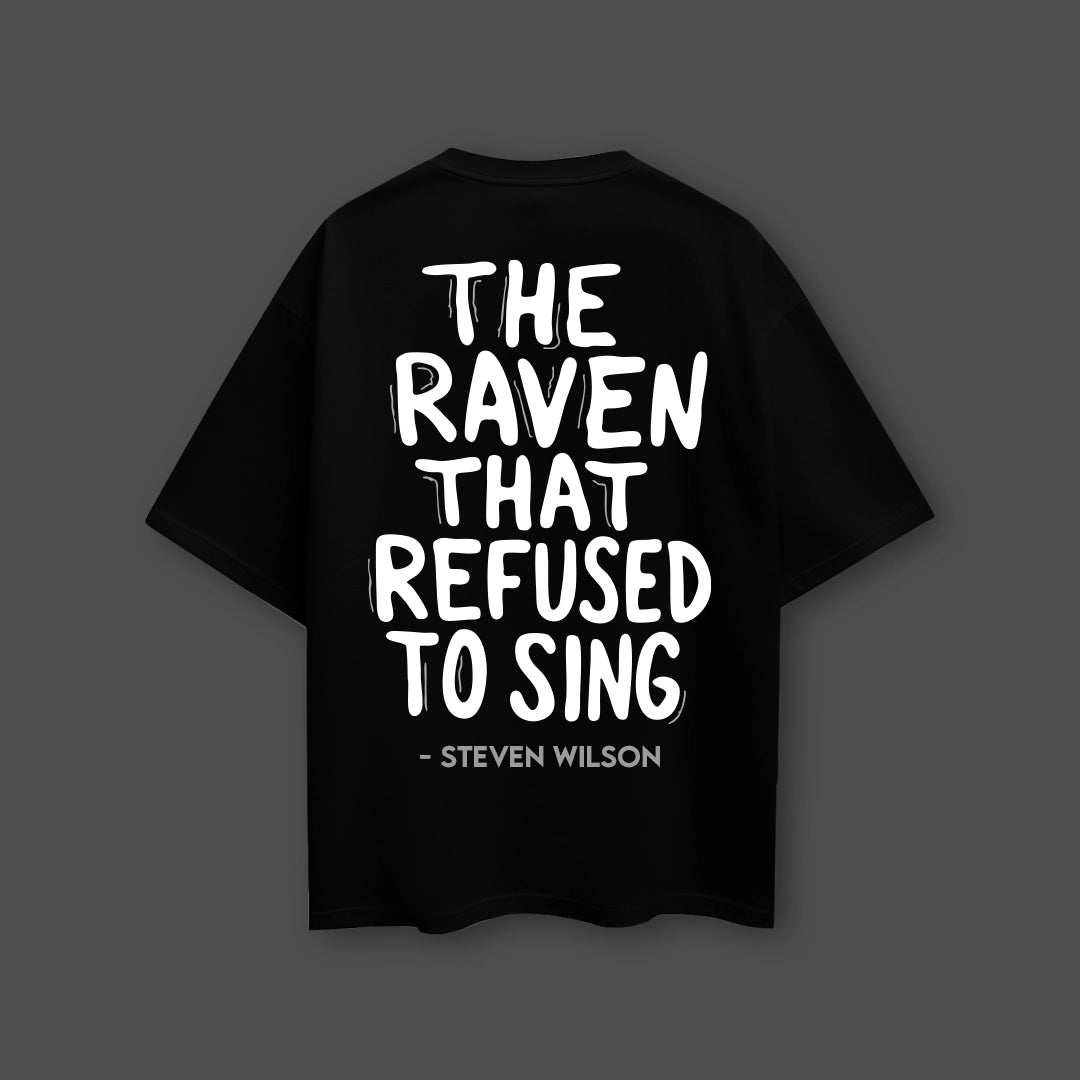 Oversized black t-shirt streetwear featuring bold text design on the back