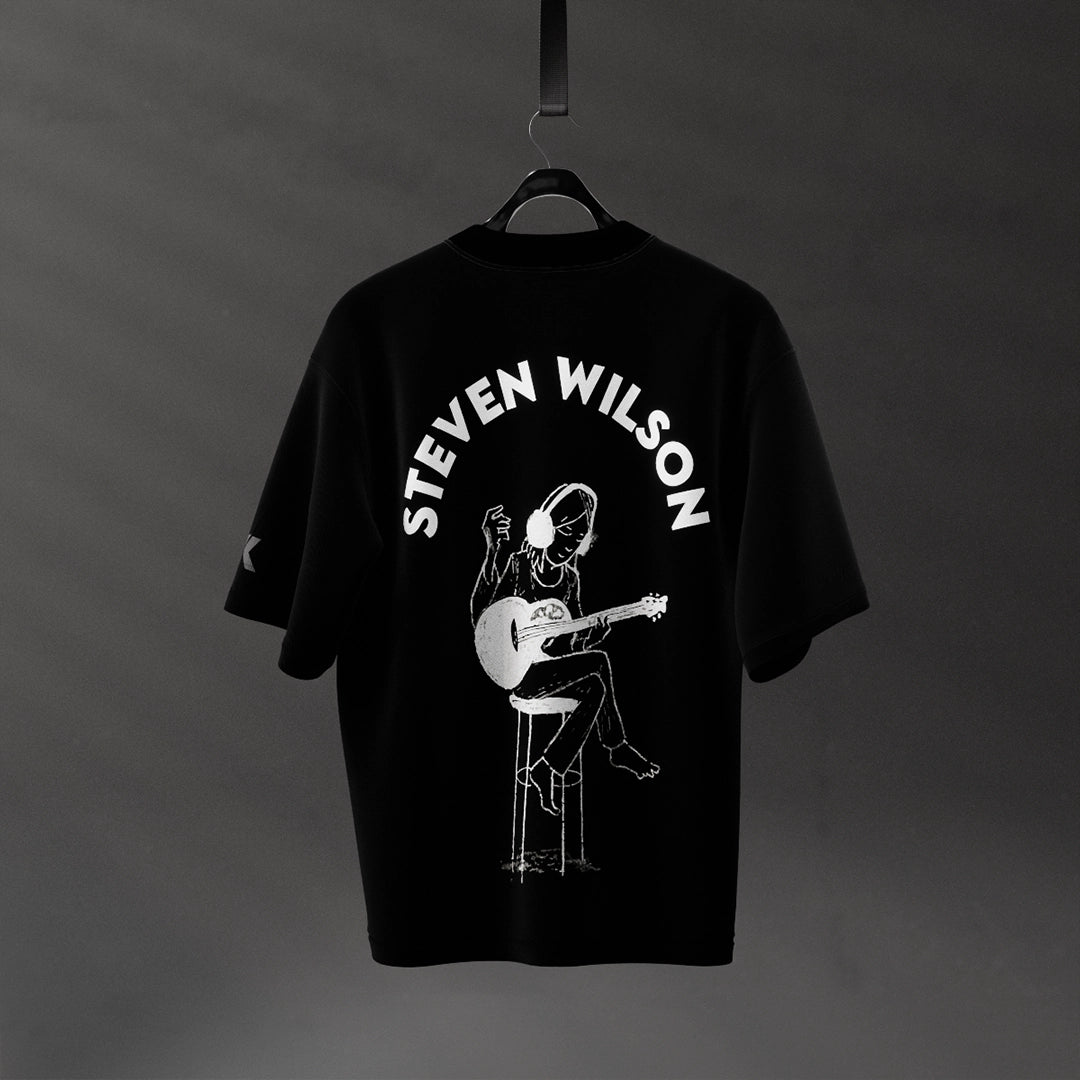 Steven Wilson oversized black t-shirt featuring a graphic of a musician playing guitar on the back