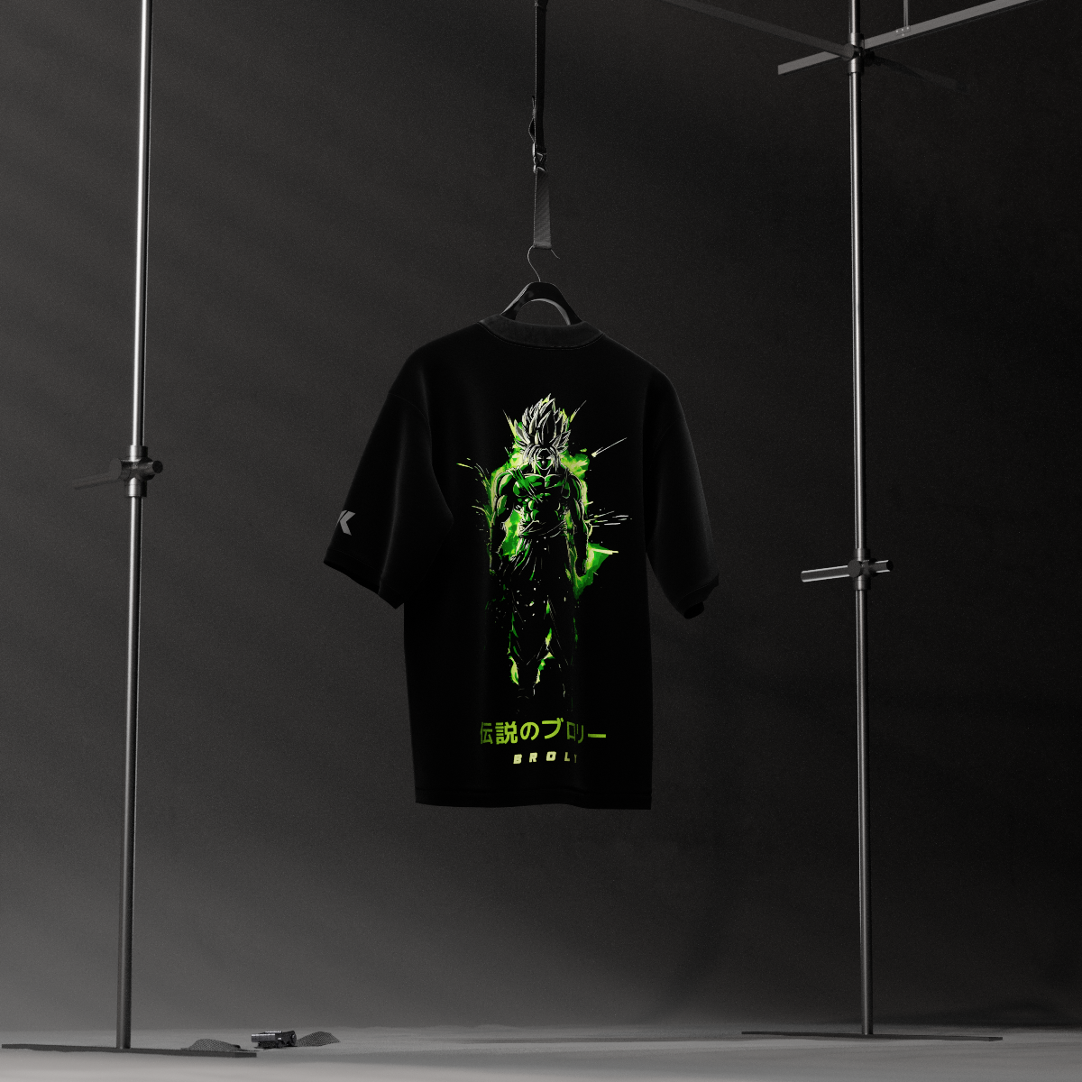 Vlack black oversized t-shirt with neon green Broly graphic on back hanging in studio Broly Dragon Ball Z black oversized t-shirt