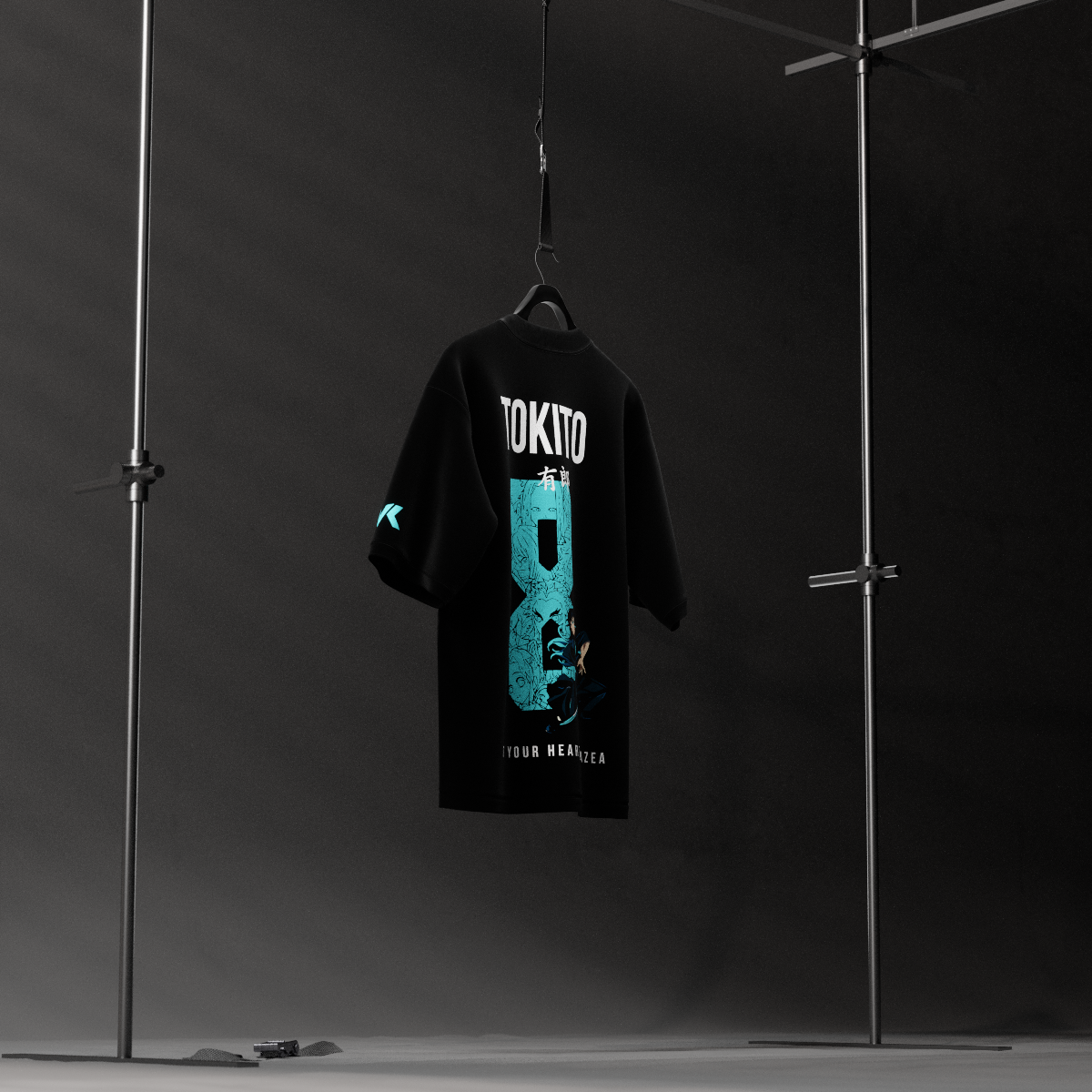 Vlack Black oversize Muichiro Tokito Demon Slayer t-shirt with large turquoise back print hanging in studio