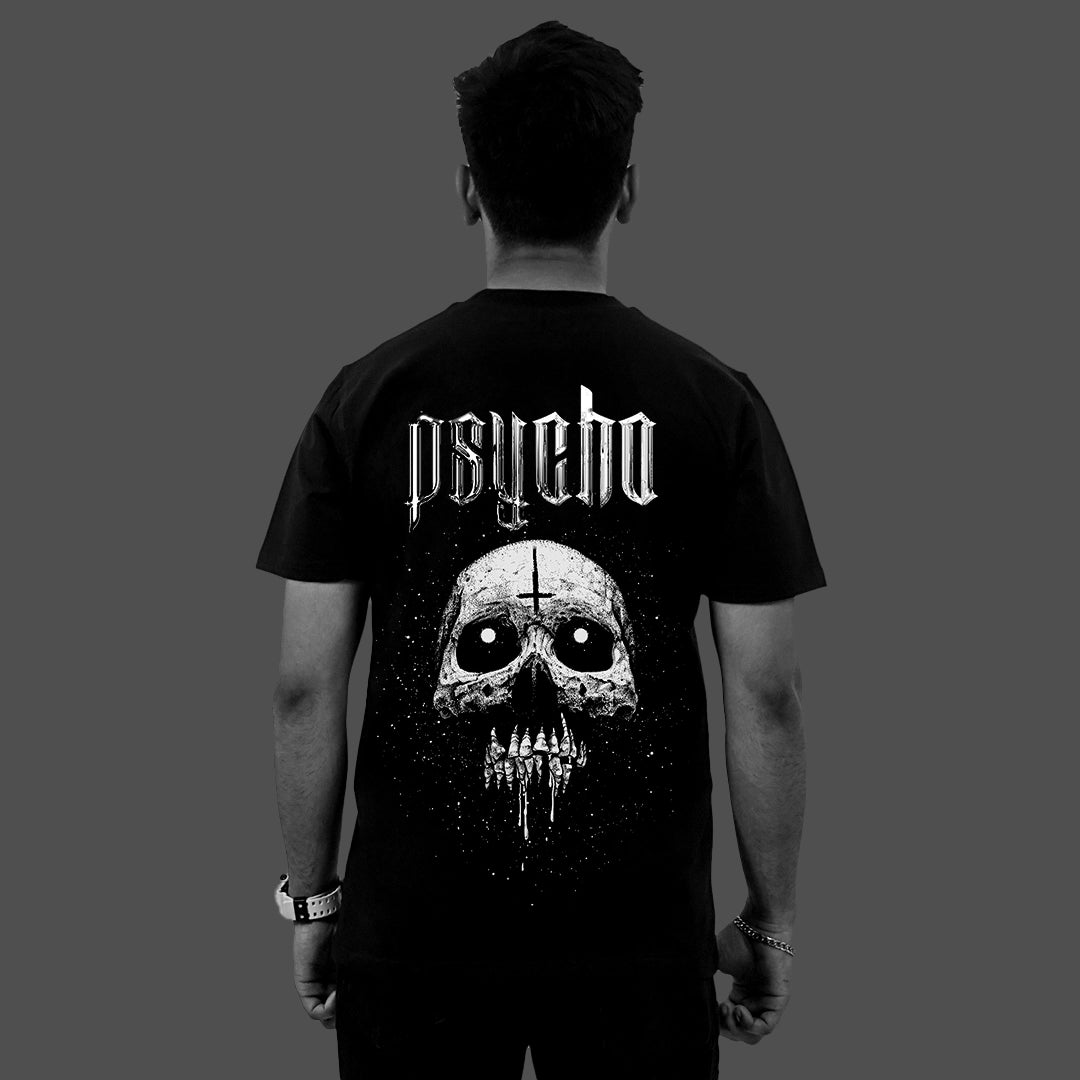 Back view of model wearing Vlack black skull graphic t-shirt regular fit with large Psycho skull print