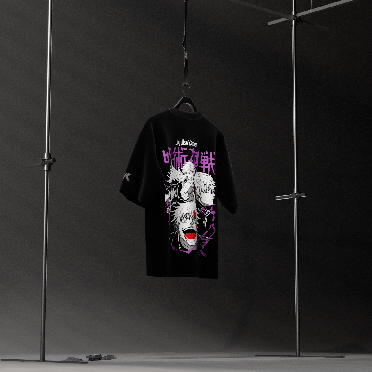Satoru Gojo black oversized t-shirt hanging on a hanger in a studio with purple anime face print white hair and red mouth