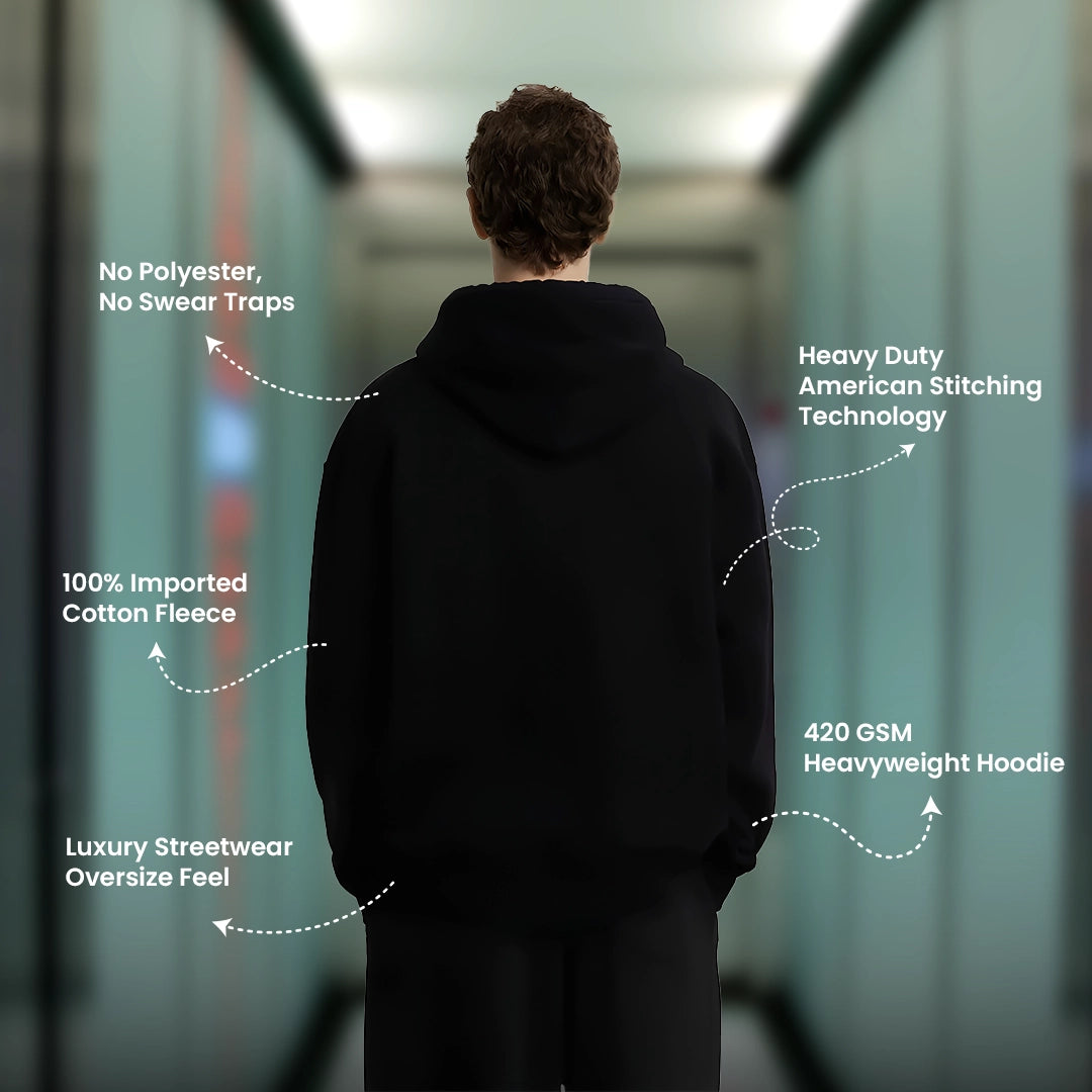 Black oversized streetwear hoodie made from 100% cotton fleece with heavy-duty stitching technology