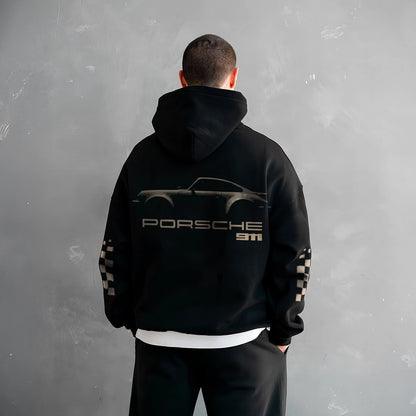 Stylish black Porsche 911 hoodie featuring a classic car design on the back