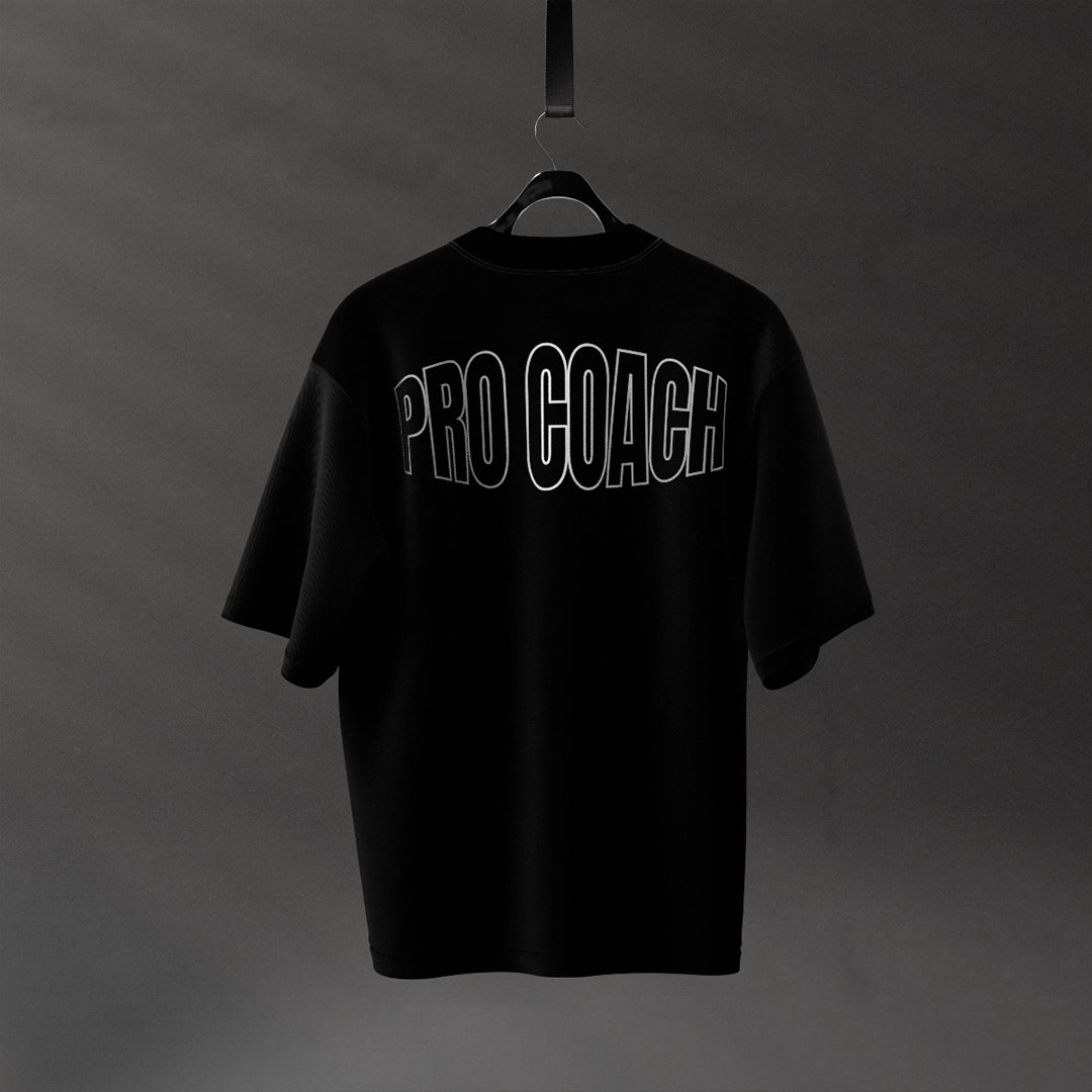 Black streetwear t-shirt from Vlack with 'PRO COACH' text design on the back