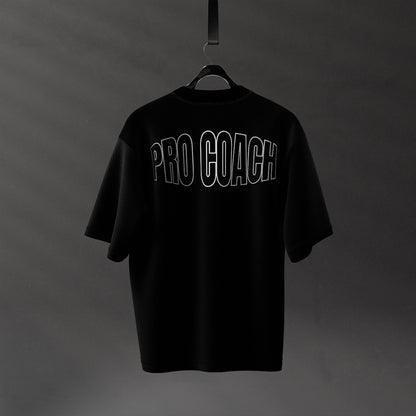 Black streetwear t-shirt from Vlack with 'PRO COACH' text design on the back