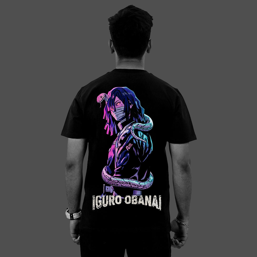 Back view of model wearing Vlack Regular Fit Iguro Obanai black t-shirt with neon purple blue snake artwork