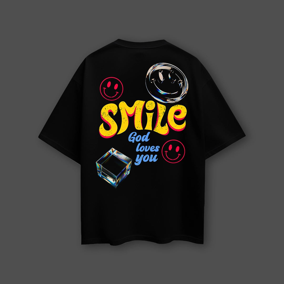 God Loves You oversized black t-shirt featuring colorful graphics and smiley icons
