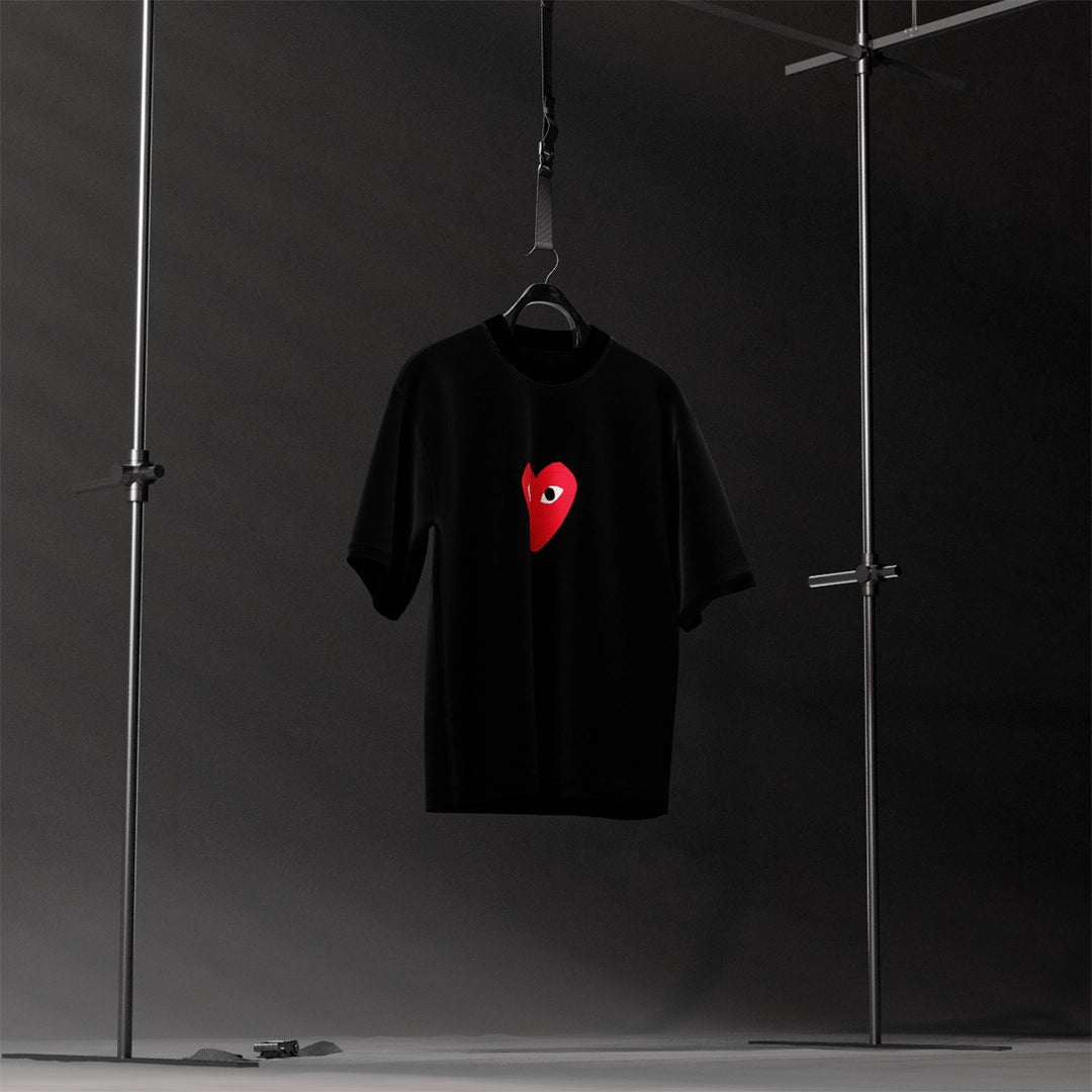 Oversized black heart eyes t-shirt featuring a striking red heart design for a trendy look