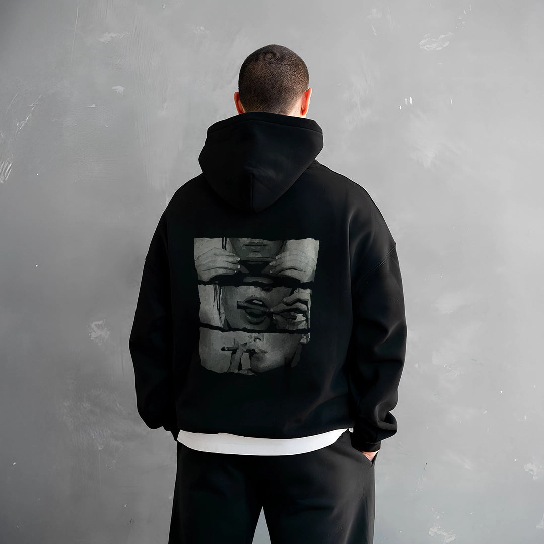 Men's oversized black hoodie for men featuring a unique graphic design on the back