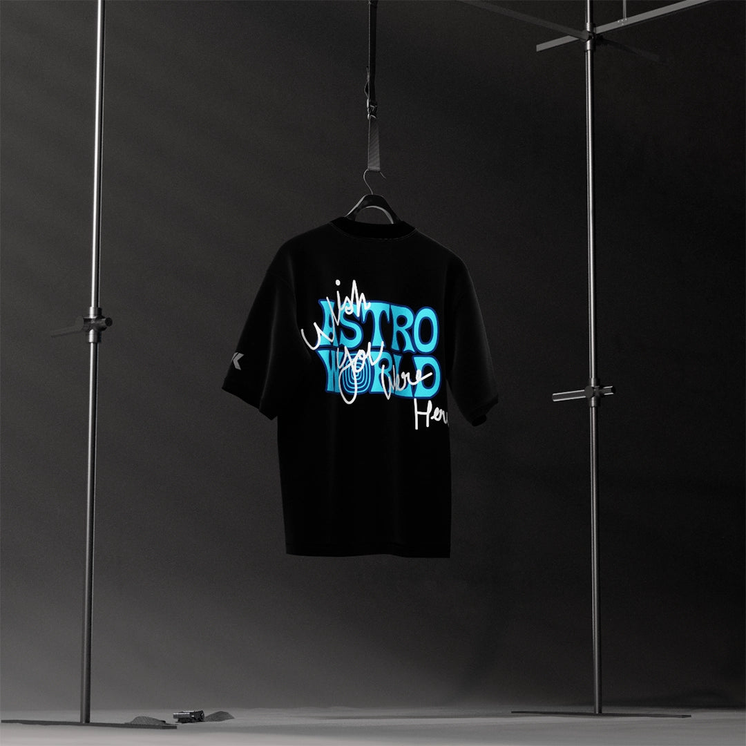 Travis Scott Astro World oversized black t-shirt featuring bold blue graphic design on back
