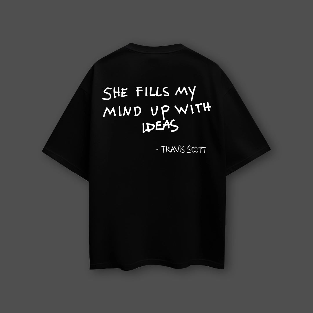 Travis Scott black oversized t-shirt featuring a quote on the back for a trendy streetwear style