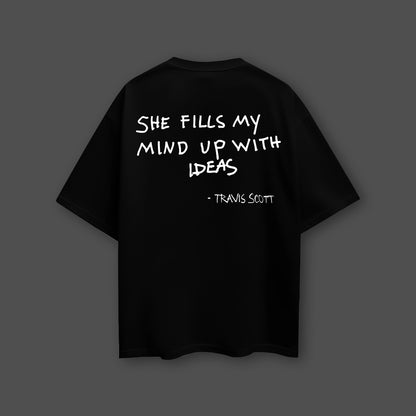 Travis Scott black oversized t-shirt featuring a quote on the back for a trendy streetwear style