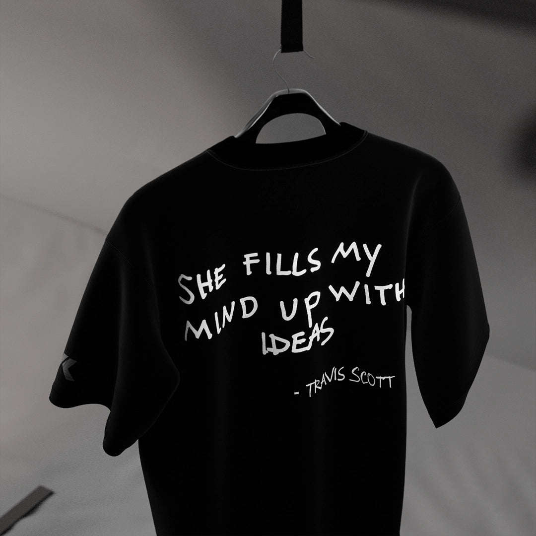 Travis Scott black oversized t-shirt featuring unique graphic design and comfortable fit