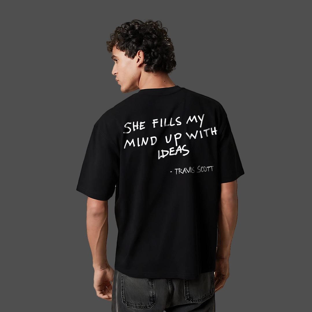 Travis Scott black oversized t-shirt featuring a unique quote on the back for stylish music fans