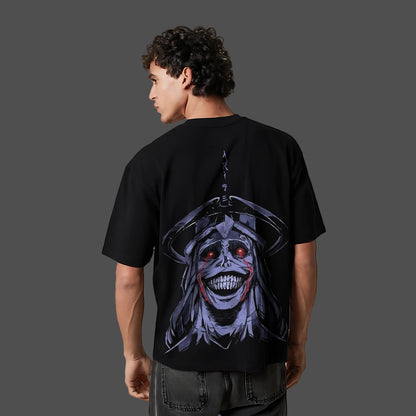Model wearing Solo Leveling black oversized t-shirt with large back anime graphic of shadowed figure holding dagger