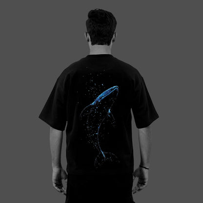 Vlack black oversize streetwear t-shirt back view with blue whale constellation graphic on relaxed fit
