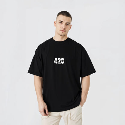 Mens black oversized 420 t-shirt featuring a bold 420 graphic on the front
