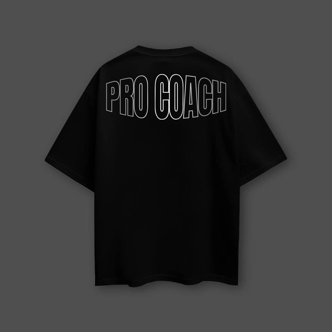 Black oversized streetwear t-shirt featuring a bold PRO COACH graphic on the back