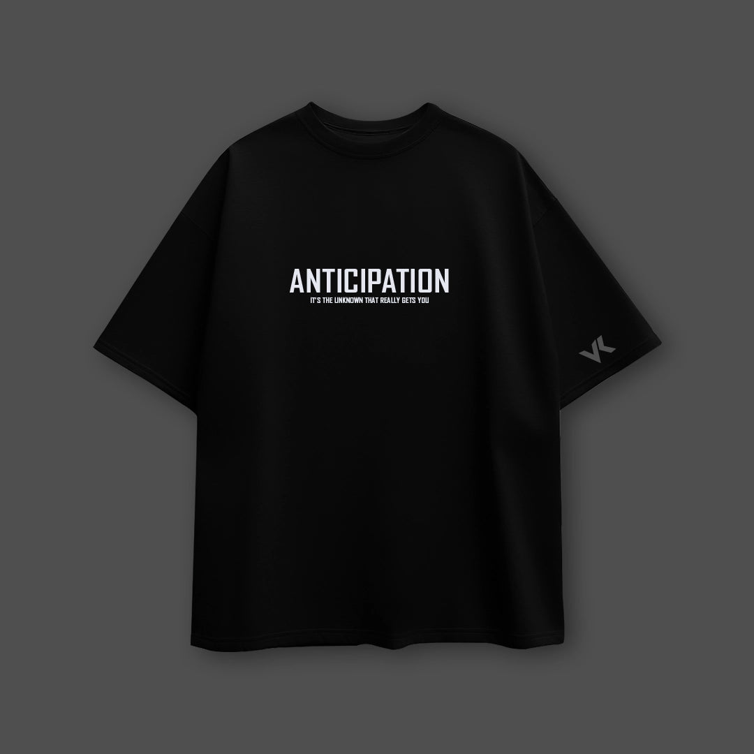 Vlack black oversized streetwear t-shirt featuring 'ANTICIPATION' graphic for comfortable casual wear
