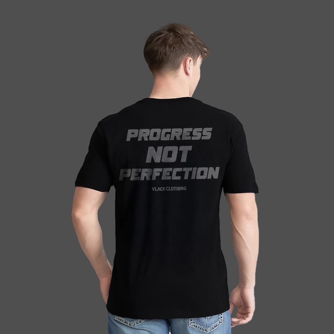Regular fit black streetwear t-shirt featuring the phrase 'Progress Not Perfection' on the back